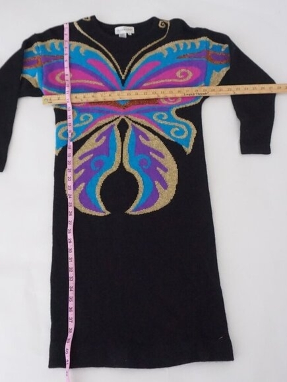 Black Sweater Dress with Vibrant Butterfly Motif